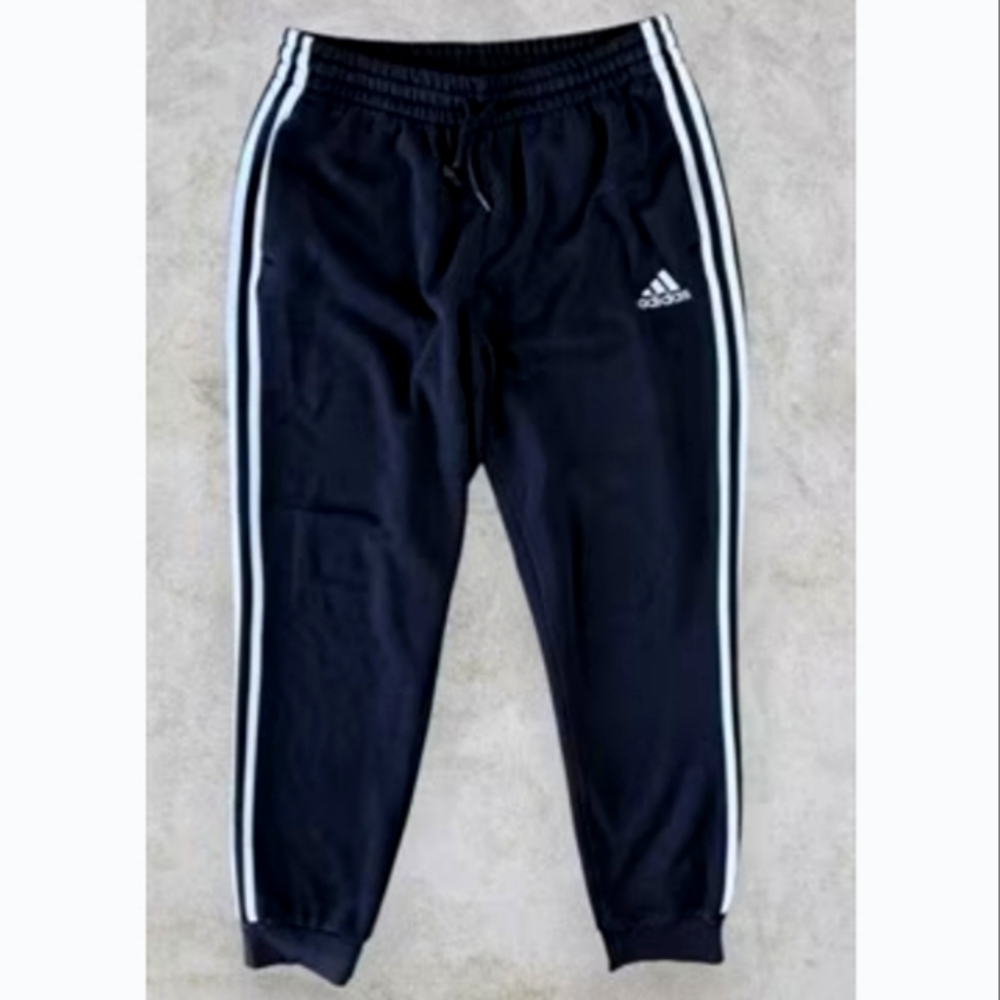 Adidas sweatpants the color blue and white and the size L